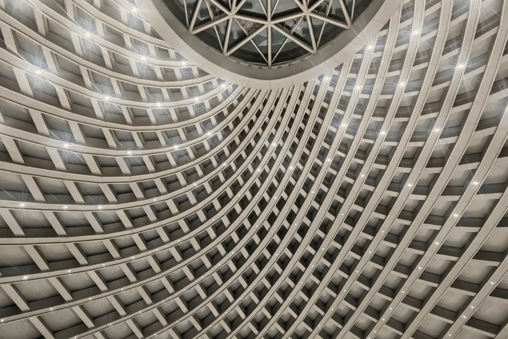 Vaulted coffered ceiling rising to a circular glazed oculus